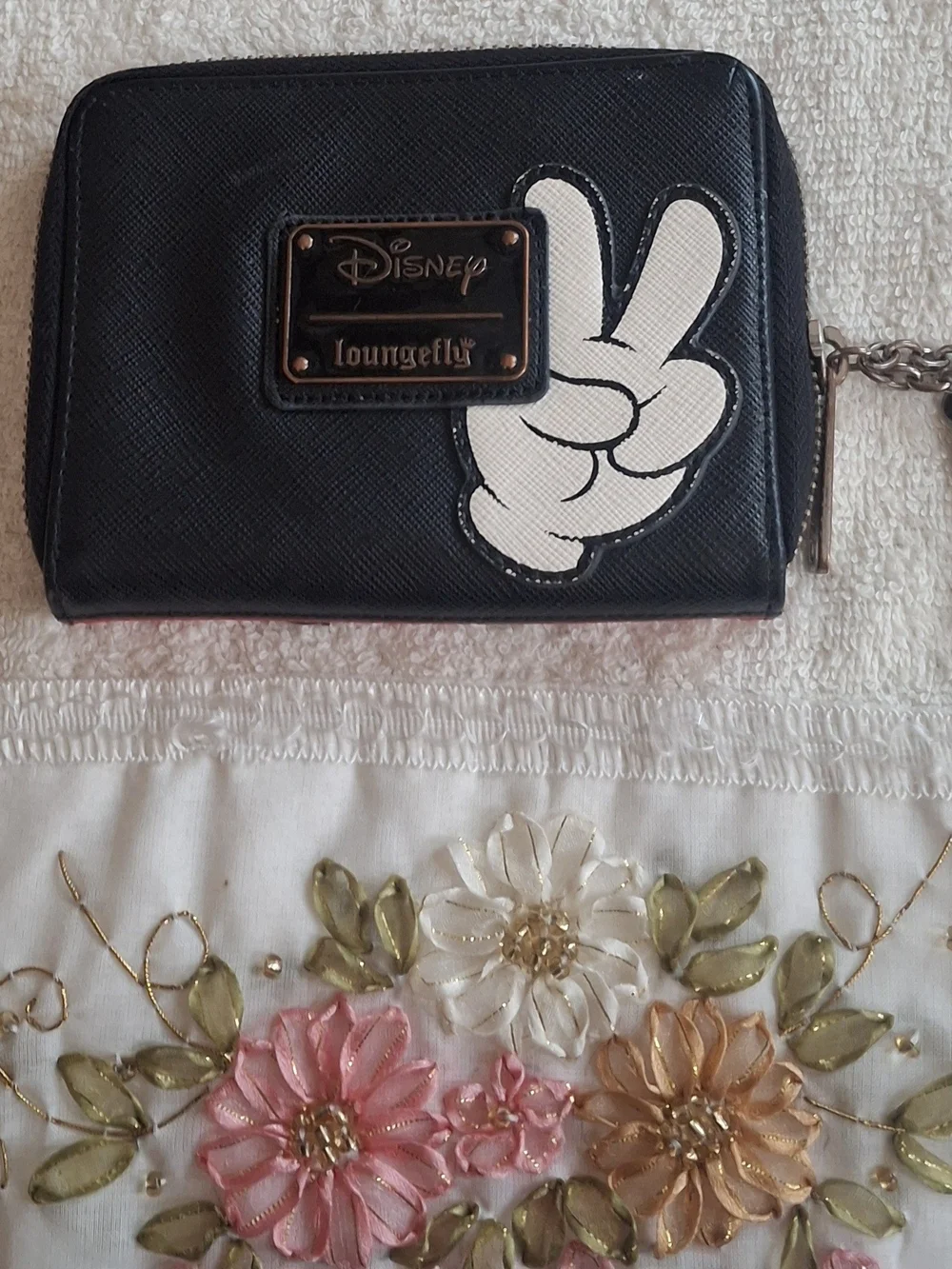Disney Loungefly zip-around wallet featuring a white Mickey Mouse gloved hand